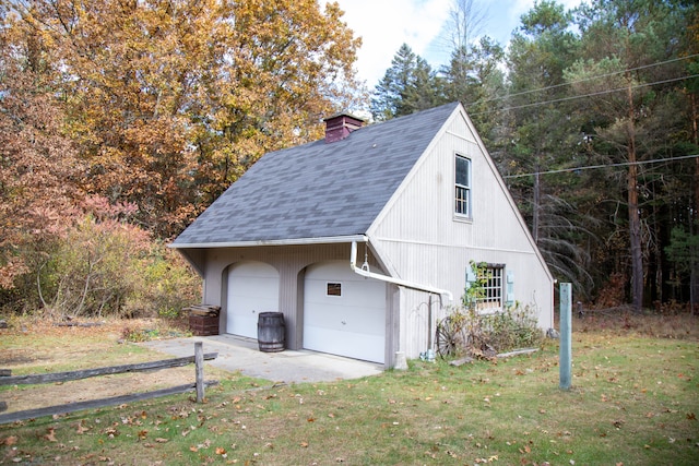 garage featuring a yard