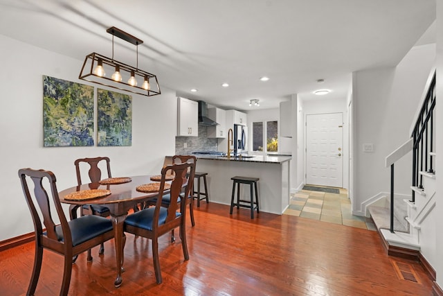 dining room featuring light wood-type flooring