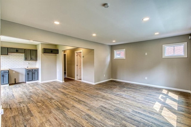 unfurnished living room featuring light hardwood / wood-style floors