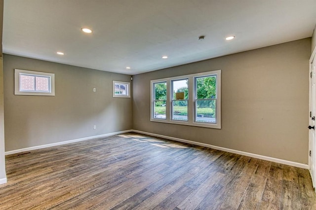 empty room featuring hardwood / wood-style floors