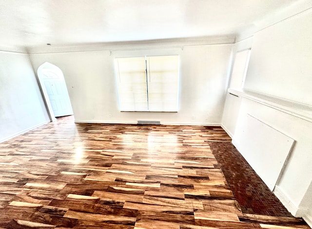 spare room featuring hardwood / wood-style flooring