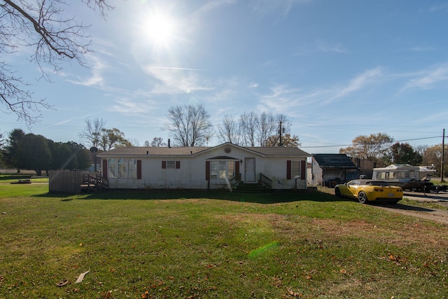 view of front of house with a front lawn