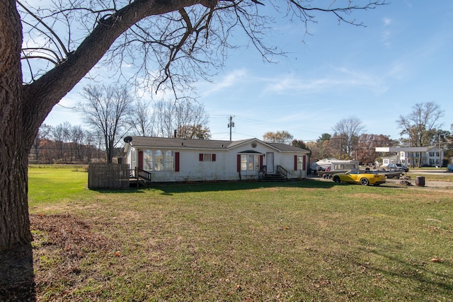 exterior space with a front lawn