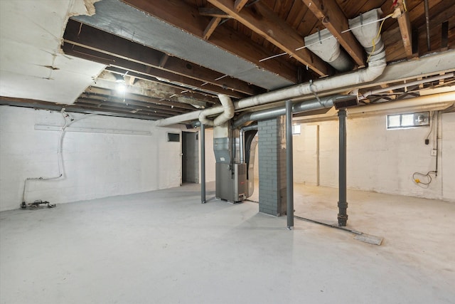 basement featuring heating unit