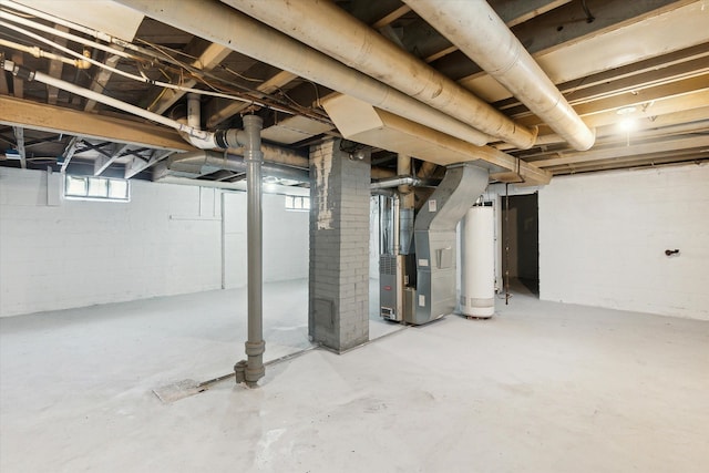 basement with heating unit and water heater