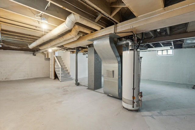 basement with heating unit and gas water heater