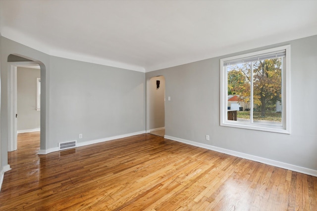 unfurnished room with light hardwood / wood-style floors