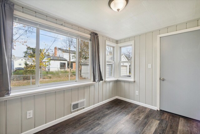 unfurnished sunroom featuring a healthy amount of sunlight