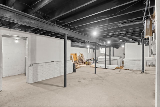 basement with washing machine and clothes dryer