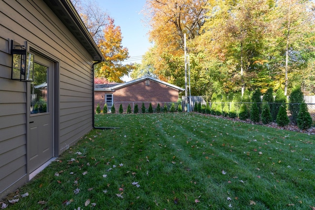 view of yard with fence