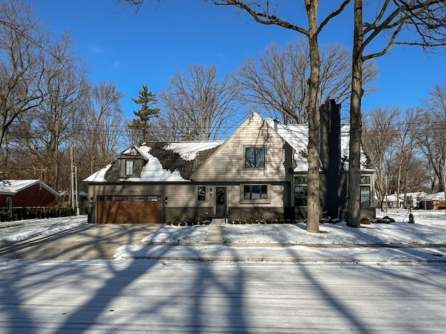 exterior space featuring an attached garage and driveway