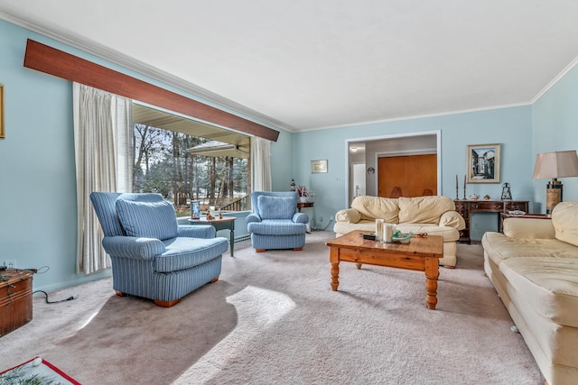 carpeted living room with ornamental molding