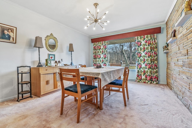 carpeted dining area with a chandelier and crown molding