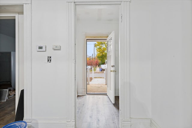 entryway with light hardwood / wood-style flooring