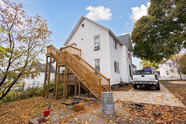 back of house with a water view