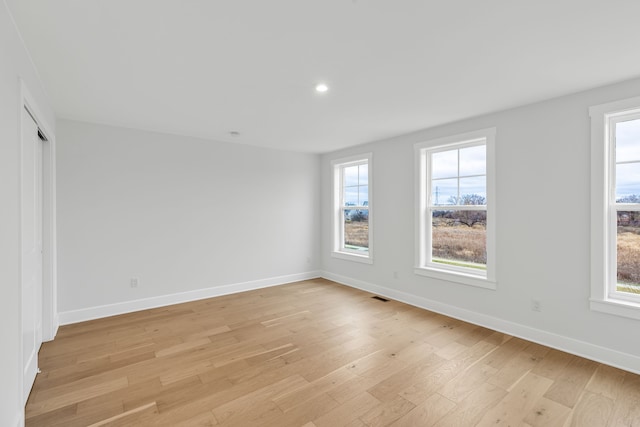 empty room featuring light hardwood / wood-style floors