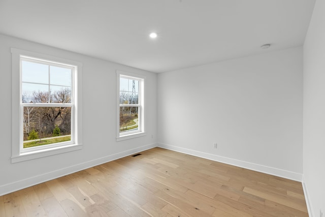 empty room featuring light hardwood / wood-style floors