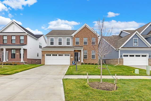 view of front of home with a front lawn and a garage