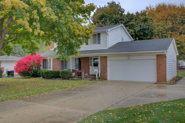 view of front facade with a front yard and a garage