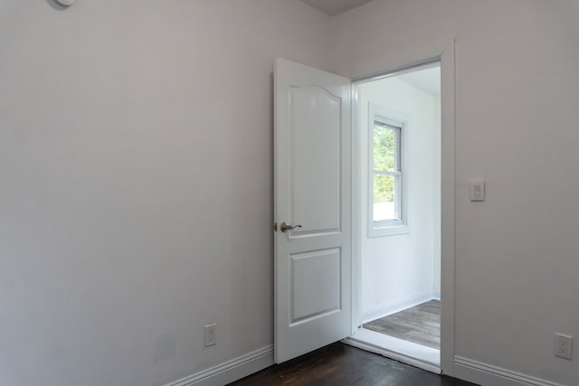 doorway featuring dark hardwood / wood-style flooring