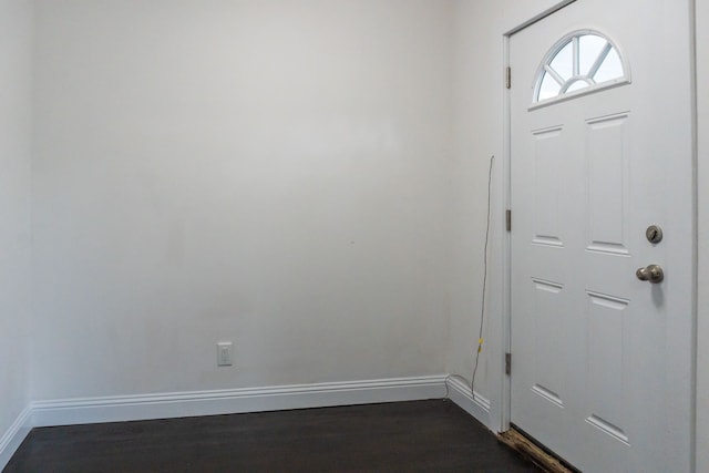 doorway featuring dark hardwood / wood-style floors