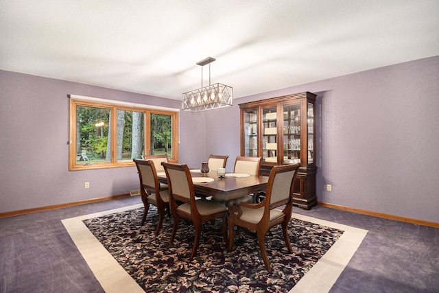 carpeted dining space with a notable chandelier