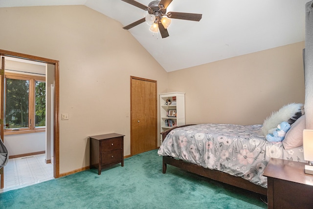 carpeted bedroom featuring ceiling fan and lofted ceiling