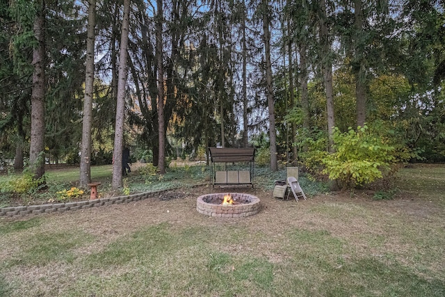 view of yard featuring a fire pit