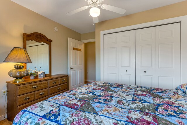 381 S Lorenz Rd, Tawas City, MI 48763 - bedroom with a closet, a ceiling fan, and baseboards