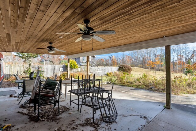 381 S Lorenz Rd, Tawas City, MI 48763 - view of patio with outdoor dining space and a ceiling fan