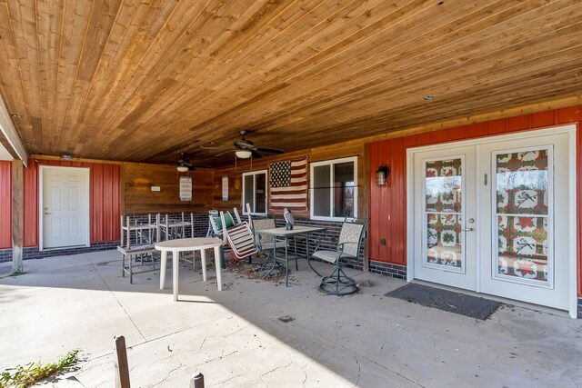 381 S Lorenz Rd, Tawas City, MI 48763 - view of patio / terrace featuring outdoor dining area and a ceiling fan