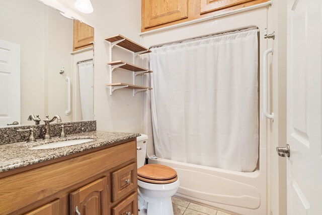381 S Lorenz Rd, Tawas City, MI 48763 - bathroom featuring toilet, vanity, tile patterned floors, and shower / bathtub combination with curtain