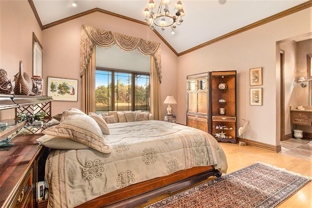 bedroom with ensuite bath, crown molding, a chandelier, lofted ceiling, and light wood-type flooring