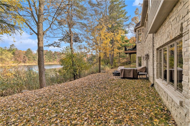 view of yard with a water view