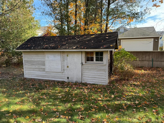 view of outdoor structure with a lawn