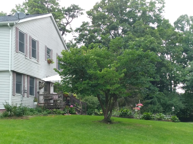 view of yard featuring a wooden deck