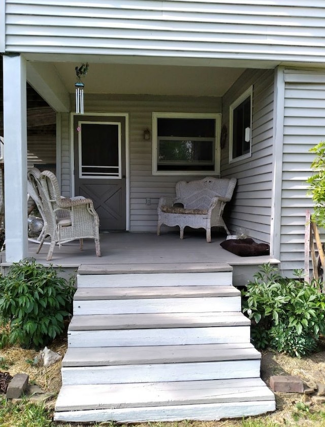 entrance to property with a porch