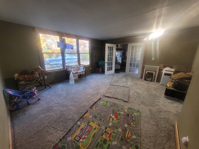 interior space featuring carpet and french doors