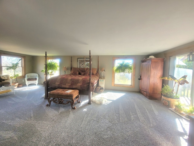 bedroom featuring light carpet