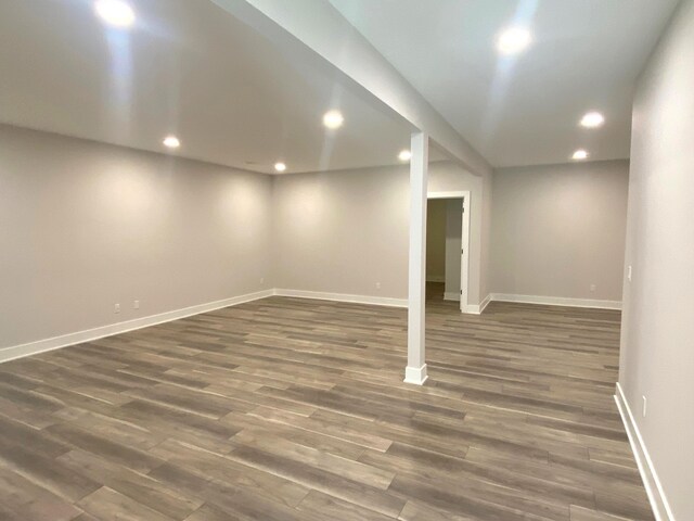 7480/7482 Head Rd, Delton, MI 49046 - finished basement with recessed lighting, wood finished floors, and baseboards
