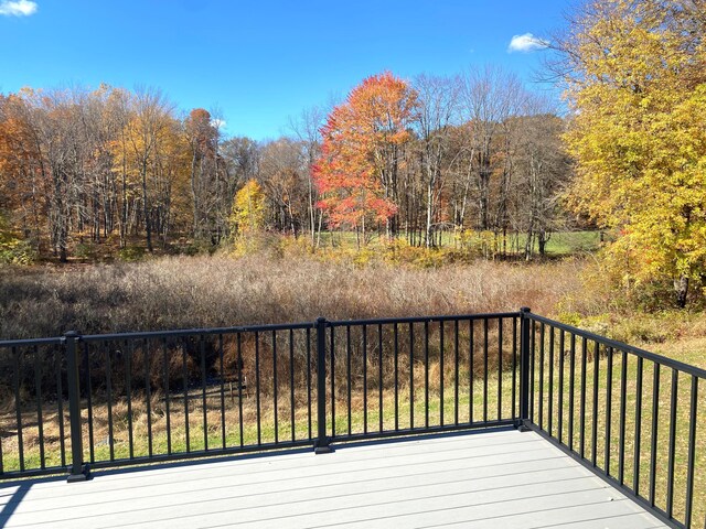 7480/7482 Head Rd, Delton, MI 49046 - wooden terrace with a wooded view