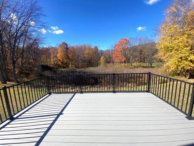7480/7482 Head Rd, Delton, MI 49046 - deck featuring a yard and a forest view