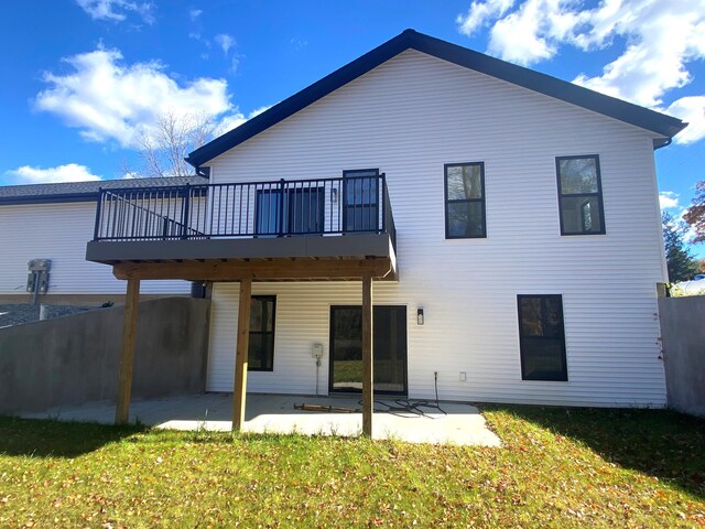 7480/7482 Head Rd, Delton, MI 49046 - back of house featuring a patio, a deck, and a yard