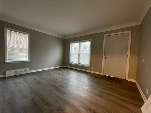 interior space with dark wood-type flooring