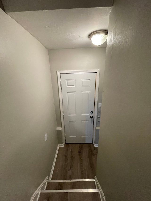 doorway to outside featuring dark hardwood / wood-style flooring