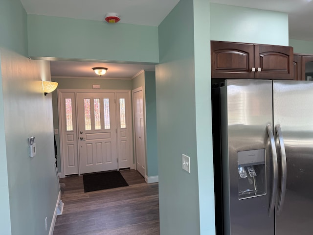 foyer entrance with dark hardwood / wood-style flooring