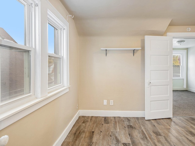 spare room featuring hardwood / wood-style floors