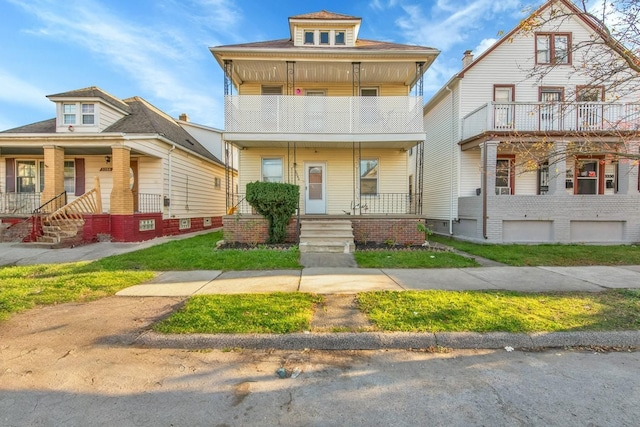 view of front of house featuring a balcony and a porch