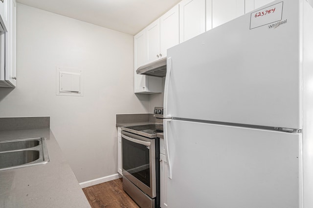 kitchen with white refrigerator, sink, electric range, dark hardwood / wood-style flooring, and white cabinetry