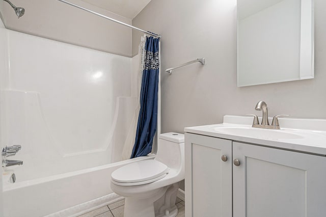 full bathroom with toilet, shower / bath combo, vanity, and tile patterned floors